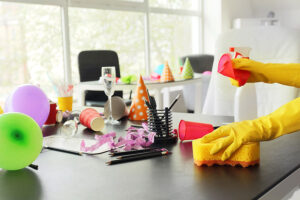 A cleaning professional using quality products and materials to clean up after a residential home party in O’Fallon, MO.